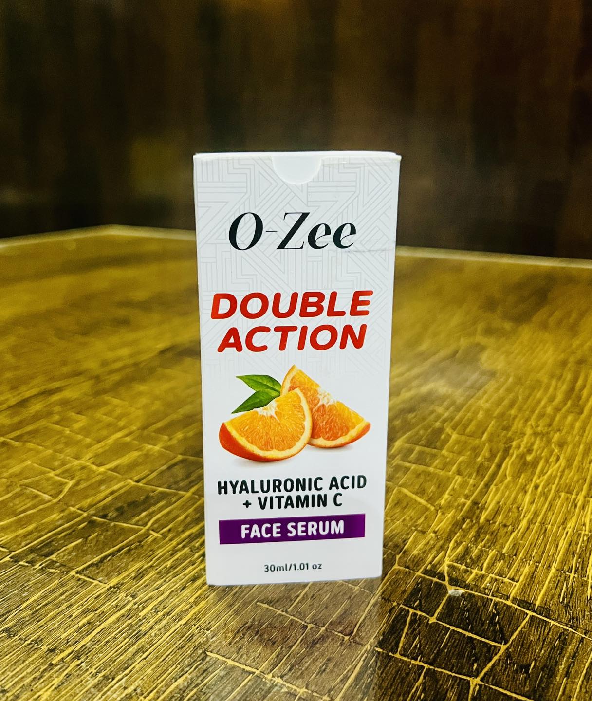 Close-up of O-Zee Serum on skin showing natural radiant glow